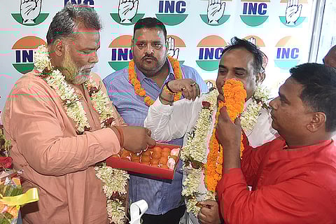 Pappu Yadav being felicitated